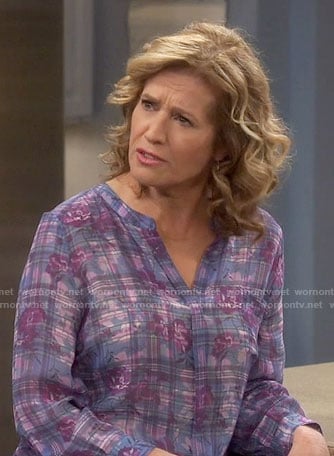 Vanessa’s purple plaid and floral blouse on Last Man Standing