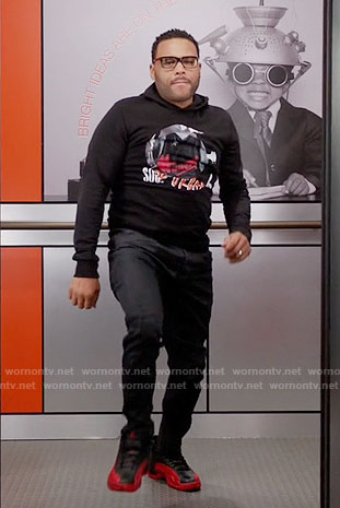 Andre's black graphic hoodie and black and red sneakers on Black-ish