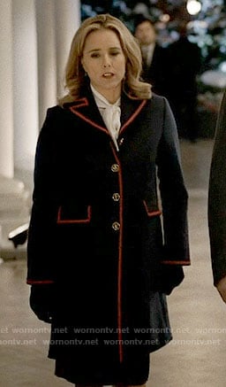 Elizabeth's navy coat with red trim on Madam Secretary