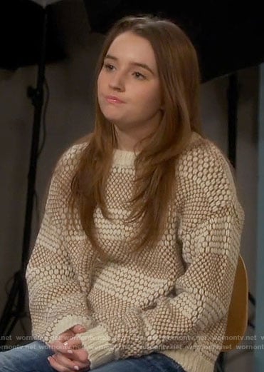 Eve’s cream honeycomb striped sweater on Last Man Standing