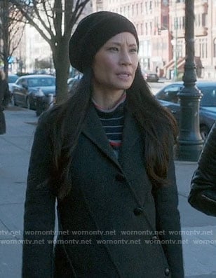 Joan's black and red striped turtleneck sweater on Elementary