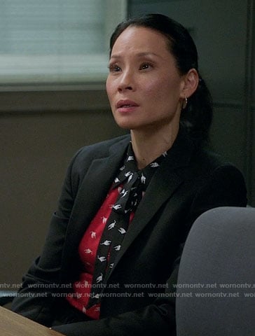 Joan's red and black bird print top on Elementary