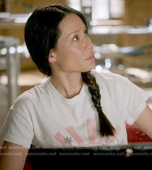 Joan's graphic t-shirt on Elementary