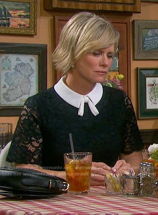 Kayla's navy lace dress with white collar and tie on Days of our Lives