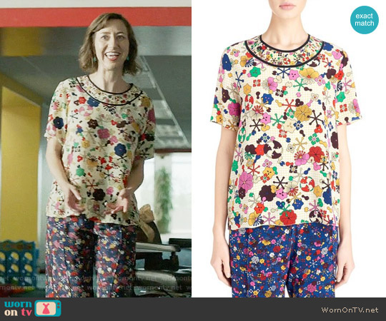 Kenzo 'Tanami Flower' Silk Crepe Top worn by Carol Pilbasian (Kristen Schaal) on Last Man On Earth