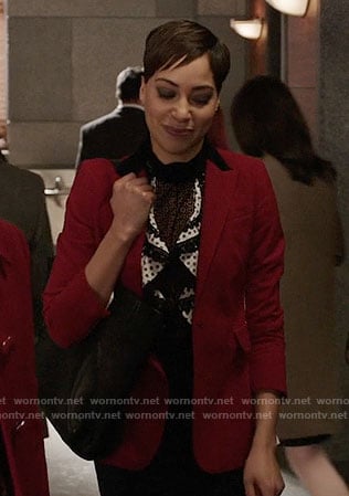 Lucca's ruffled lace-trim top and red colorblock blazer on The Good Fight