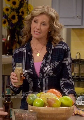 Vanessa’s dark green plaid shirt on Last Man Standing