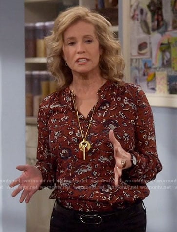 Vanessa's red printed shirt on Last Man Standing