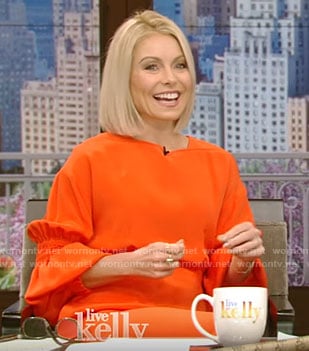 Kelly’s orange balloon sleeve dress on Live With Kelly