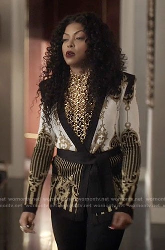 Cookie’s black, white, and gold patterned jacket on Empire