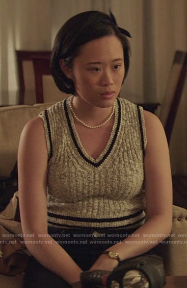 Courtney's grey sleeveless sweater with striped trim on 13 Reasons Why