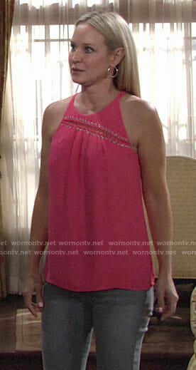 Sharon’s coral pink sleeveless slit front top on The Young and the Restless