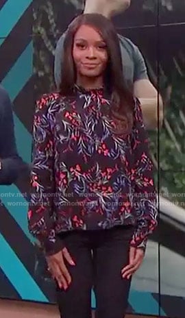 Zuri Hall’s black floral blouse on E! News