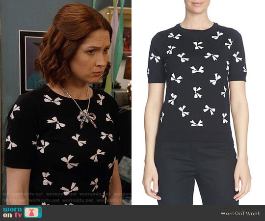 Cece Short Sleeve Bow Jacquard Pullover worn by Kimmy Schmidt (Ellie Kemper) on Unbreakable Kimmy Schmidt