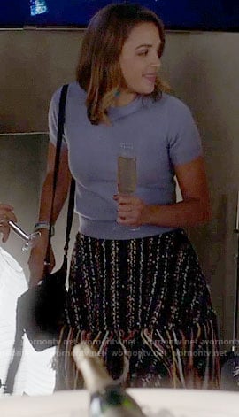 Cassie's fringed skirt and blue top on Famous in Love