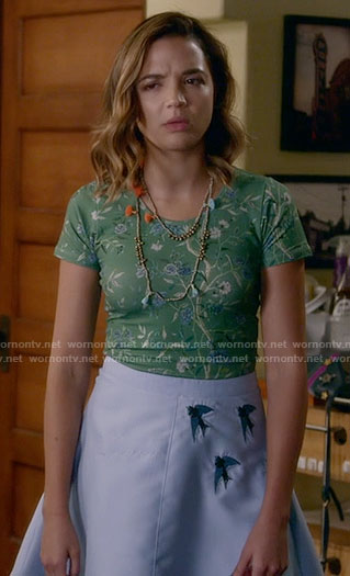 Cassie's green floral top and bird embroidered skirt on Famous in Love