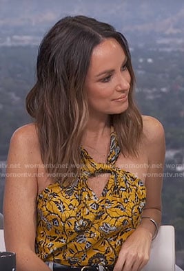 Catt’s yellow twist neck top on E! News Daily Pop