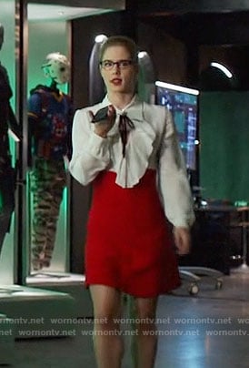Felicity's white ruffled blouse and red skirt on Arrow