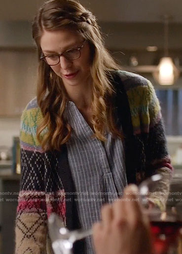 Kara’s blue striped top and multi colored cardigan on Supergirl