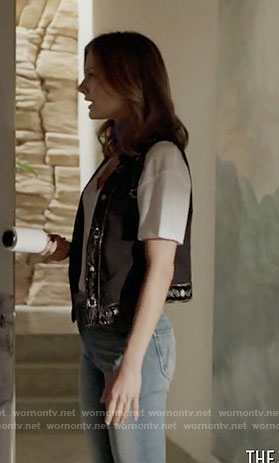 Megan's black embroidered vest on The Arrangement