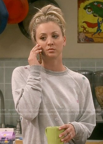 Penny's grey flower sweatshirt on The Big Bang Theory