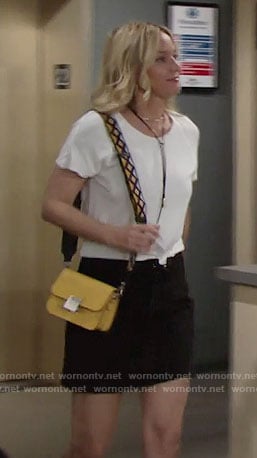 Sharon's yellow bag with embroidered strap on The Young and the Restless