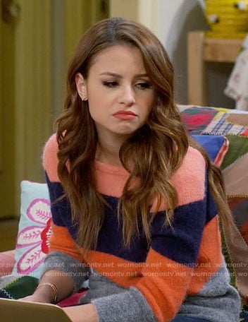 Sofia’s striped v-back sweater on Young and Hungry