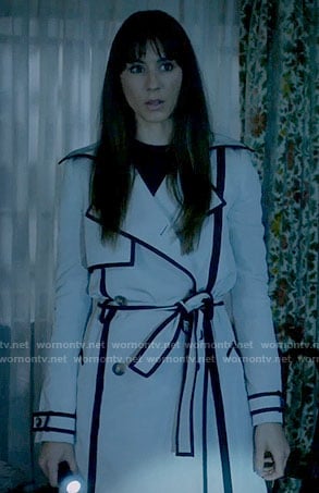 Spencer's white trench coat with black trim on Pretty Little Liars