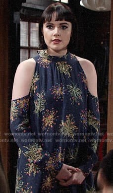 Tessa’s navy printed cold-shoulder tunic on The Young and the Restless