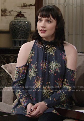 Tessa’s navy printed cold-shoulder tunic on The Young and the Restless