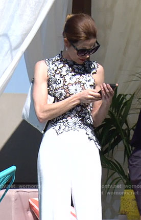 Victoria’s white floral lace top and black cat eye sunglasses on The Young and the Restless