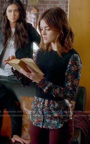 Aria's black top with floral sleeves on Pretty Little Liars