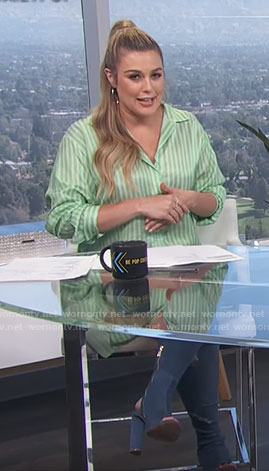 Carissa’s green striped shirt and blue boots on E! News Daily Pop