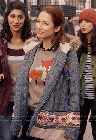 Kimmy’s fox sweater and fur hood coat on Unbreakable Kimmy Schmidt