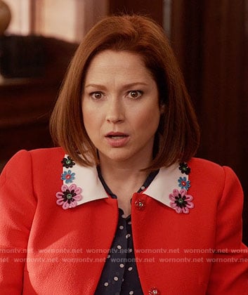 Kimmy's red coat with floral collar on Unbreakable Kimmy Schmidt