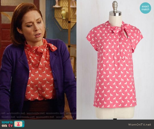 ModCloth Up, Up and Amaze Top in Unicorns worn by Kimmy Schmidt (Ellie Kemper) on Unbreakable Kimmy Schmidt