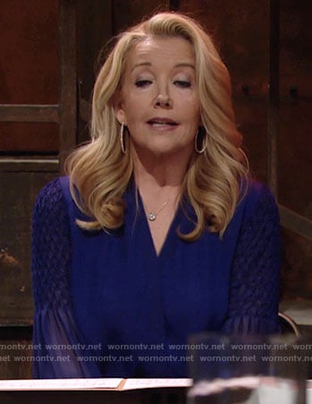 Nikki’s blue blouse with smocked sleeves on The Young and the Restless