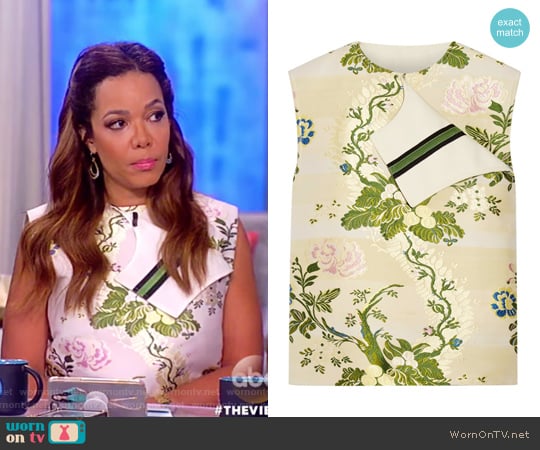 Ribbon-trimmed silk and wool-blend jacquard blouse by Calvin Klein worn by Sunny Hostin on The View