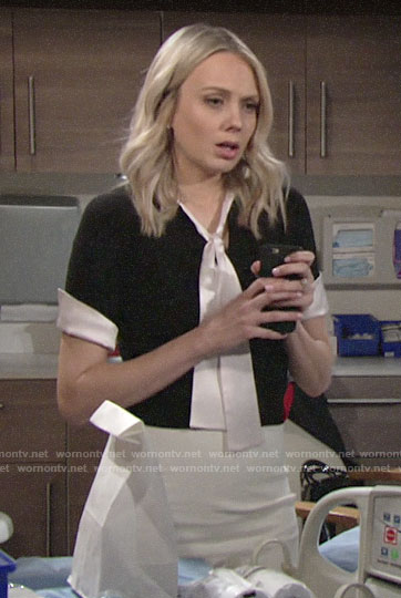 Abby’s black top with white tie neck on The Young and the Restless