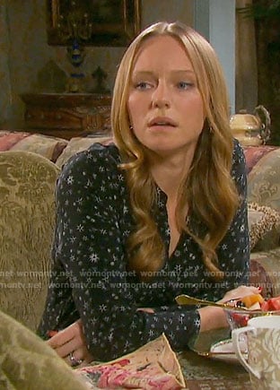 Abby’s black star print dress on Days of our Lives