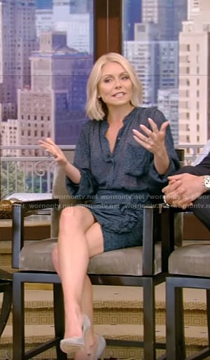 Kelly’s blue shirt and ruffled trim mini skirt on Live With Kelly