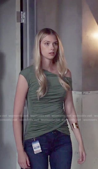 Kirsten's green wrapped one off shoulder top on Stitchers