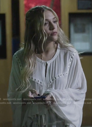 Maddie's white ruffled blouse with studs on Nashville