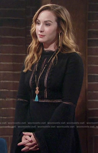 Mariah’s black bell-sleeve dress and blue tassel necklace on The Young and the Restless