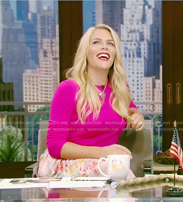Busy Phillip's pink sweater and pink floral skirt on Live with Kelly and Ryan