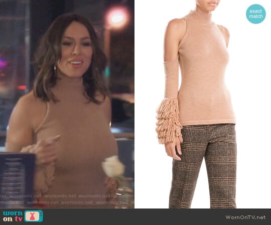 Merino Wool Pullover with Cut-Out Shoulders by Jonathan Simkhai worn by Kelly Dodd on The Real Housewives of Orange County