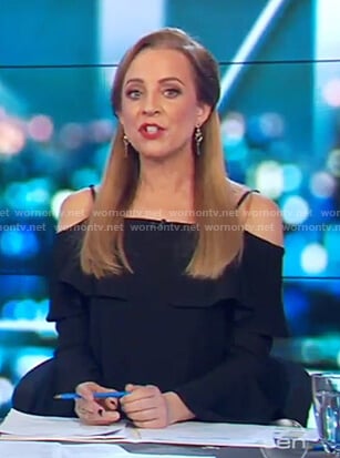 Carrie’s black cold shoulder ruffle top on The Project