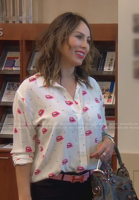 Kelly's lip print long sleeve top on The Real Housewives of OC