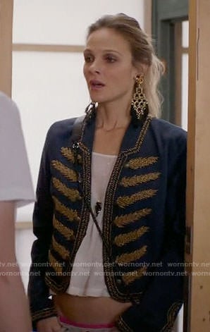 Phoebe’s blue jacket with gold embroidery and black tassel earrings on Girlfriends Guide to Divorce