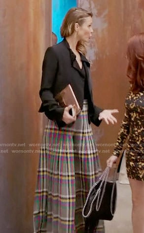 Phoebe's plaid wide-leg trousers on Girlfriends Guide to Divorce